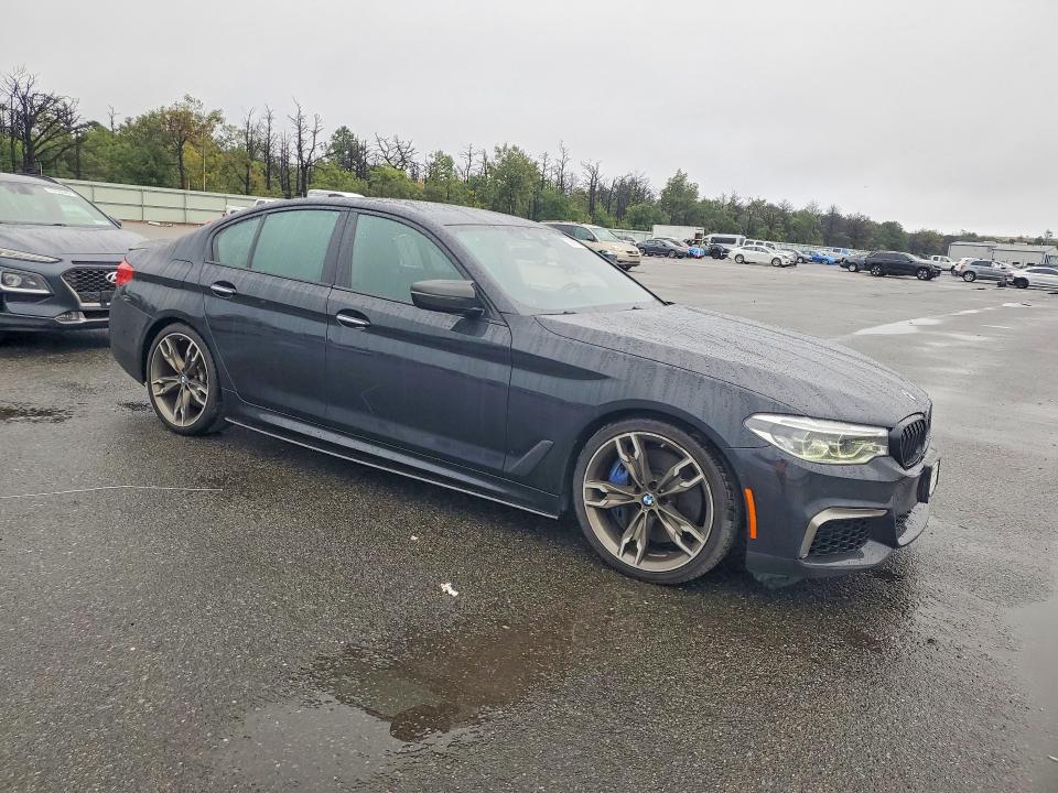 2018 BMW M5 VIN WBAJB9C58JB035348 COPART salvage auction — MINOR DENT/SCRATCHES, Nj - Certificate Of Title (P), sold $6,400 on 2026-10-02 (photo 4)