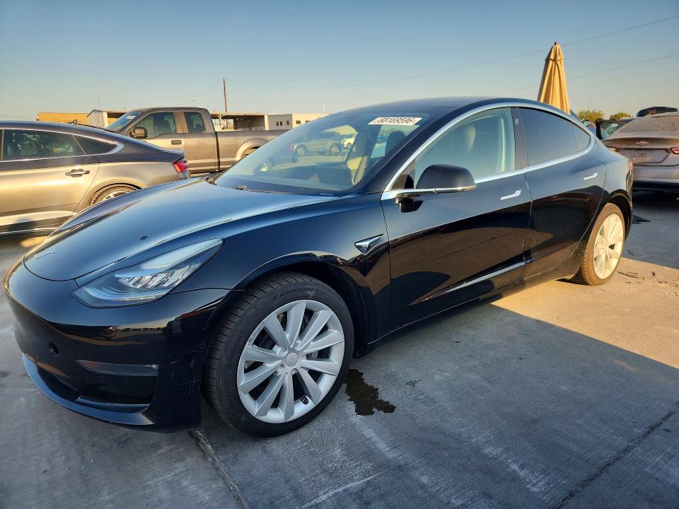 2019 Tesla Model 3 VIN 5YJ3E1EA8KF406375 COPART salvage auction — NORMAL WEAR, TX - CERT OF TITLE-REBUILT SALVAGE (P), sold $6,100 on 2026-09-29 (photo 1)