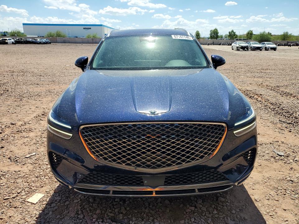 2023 Genesis Gv70 VIN KMUMADTB7PU105184 COPART salvage auction — WATER/FLOOD, AZ - CERT OF TITLE - SALVAGE, sold $18,500 on 2026-09-29 (photo 5)