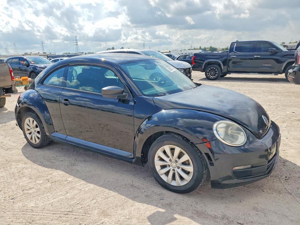 2013 Volkswagen Beetle VIN 3VWFP7AT0DM659350 COPART salvage auction — NORMAL WEAR, Mt - Certificate Of Title, sold $200 on 2026-10-10 (photo 4)