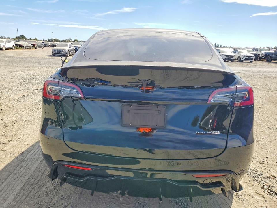 2023 Tesla Model y VIN 7SAYGDEFXPF702988 COPART salvage auction — FRONT END, Salvage Title, sold $15,600 on 2026-10-08 (photo 6)