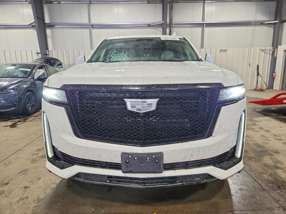 2021 Cadillac Escalade VIN 1GYS4RKL2MR437387 COPART salvage auction — REAR END, MN - CERT OF TITLE-SALVAGE, sold $23,400 on 2026-10-06 (photo 5)