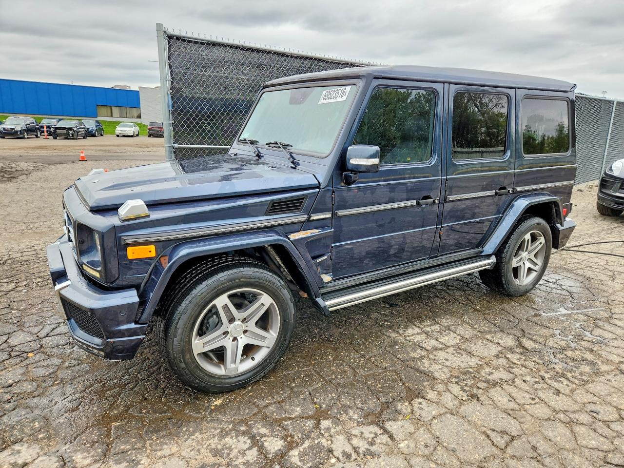 2003 Mercedes-Benz G-Class VIN WDCYR49E13X135217 — COPART salvage auction photo