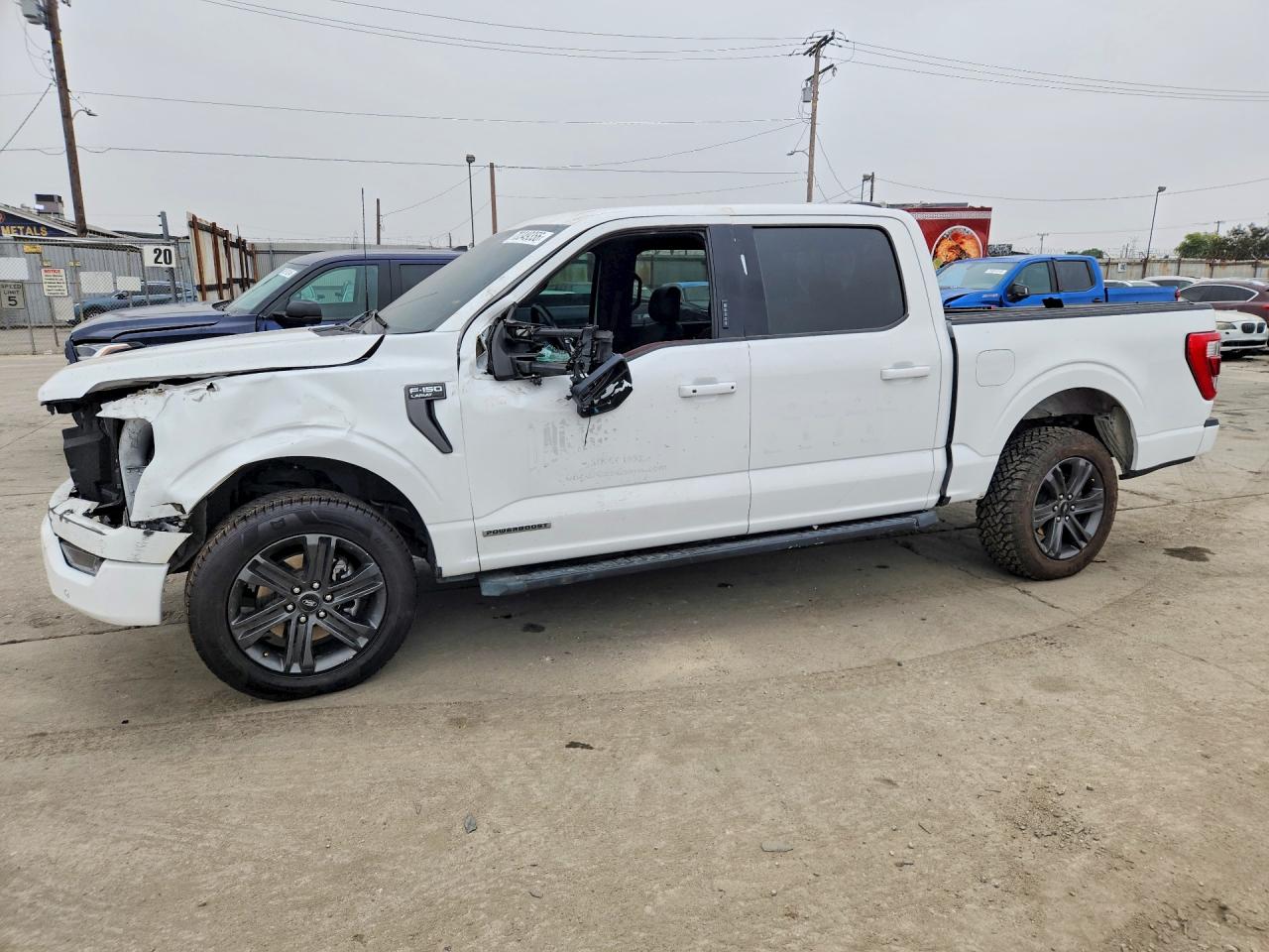 2023 Ford F-150 Lightning VIN 1FTFW1ED9PFB94111 — COPART salvage auction photo