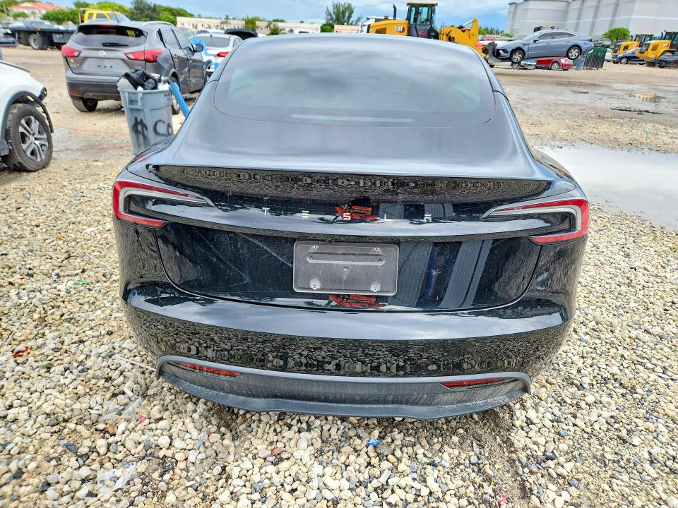 2025 Tesla Model 3 VIN 5YJ3E1EA0SF981117 COPART salvage auction — FRONT END, FL - CERT OF TITLE SLVG REBUILDABLE, sold $6,200 on 2026-10-06 (photo 6)