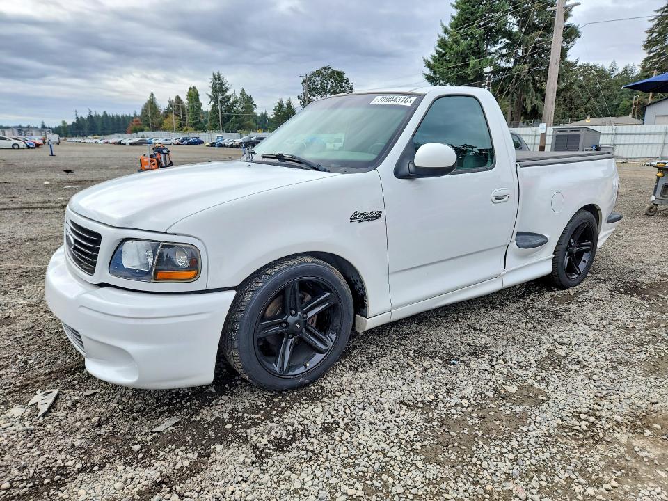 2003 Ford F-150 lightning VIN 2FTRF07353CA82925 — COPART salvage auction photo
