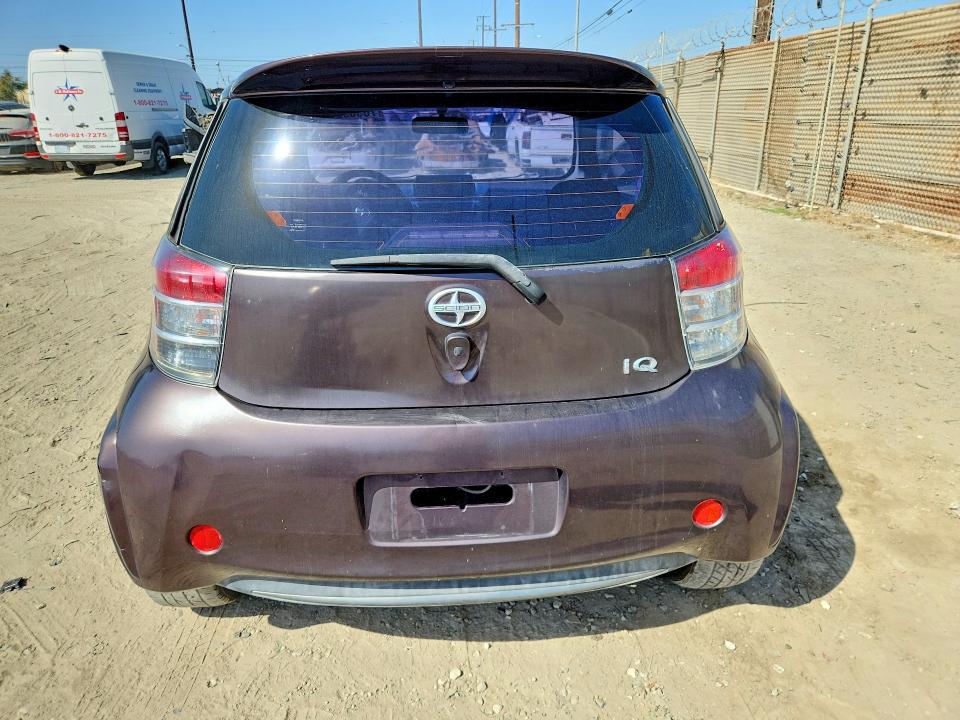 2012 Scion Iq VIN JTNJJXB05CJ012579 COPART salvage auction — MINOR DENT/SCRATCHES, Ca - Dis/Dlr/Exp Only Clean Title (P), sold $1,400 on 2026-10-05 (photo 6)
