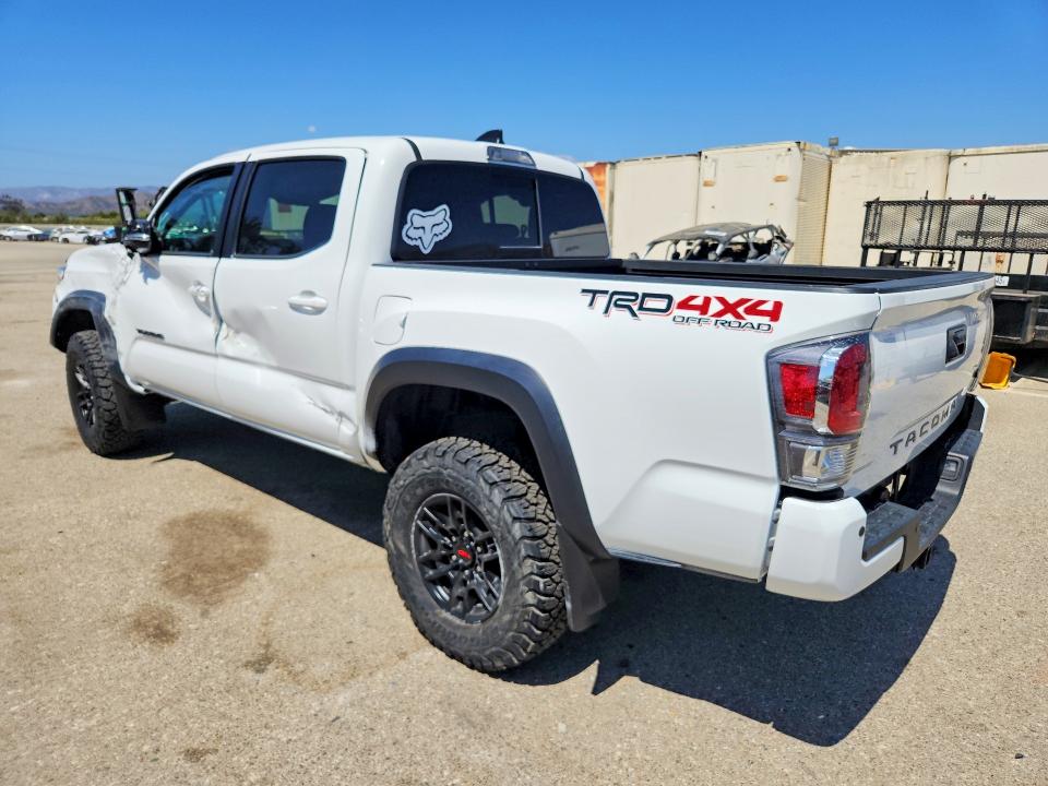 2023 Toyota Tacoma VIN 3TMCZ5AN6PM625469 COPART salvage auction — SIDE, CA - SALVAGE CERTIFICATE, sold $22,100 on 2026-09-15 (photo 2)