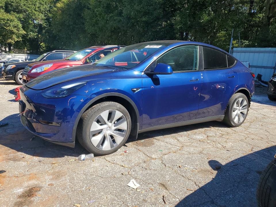 2023 Tesla Model y VIN 7SAYGAEE4PF850902 — COPART salvage auction photo