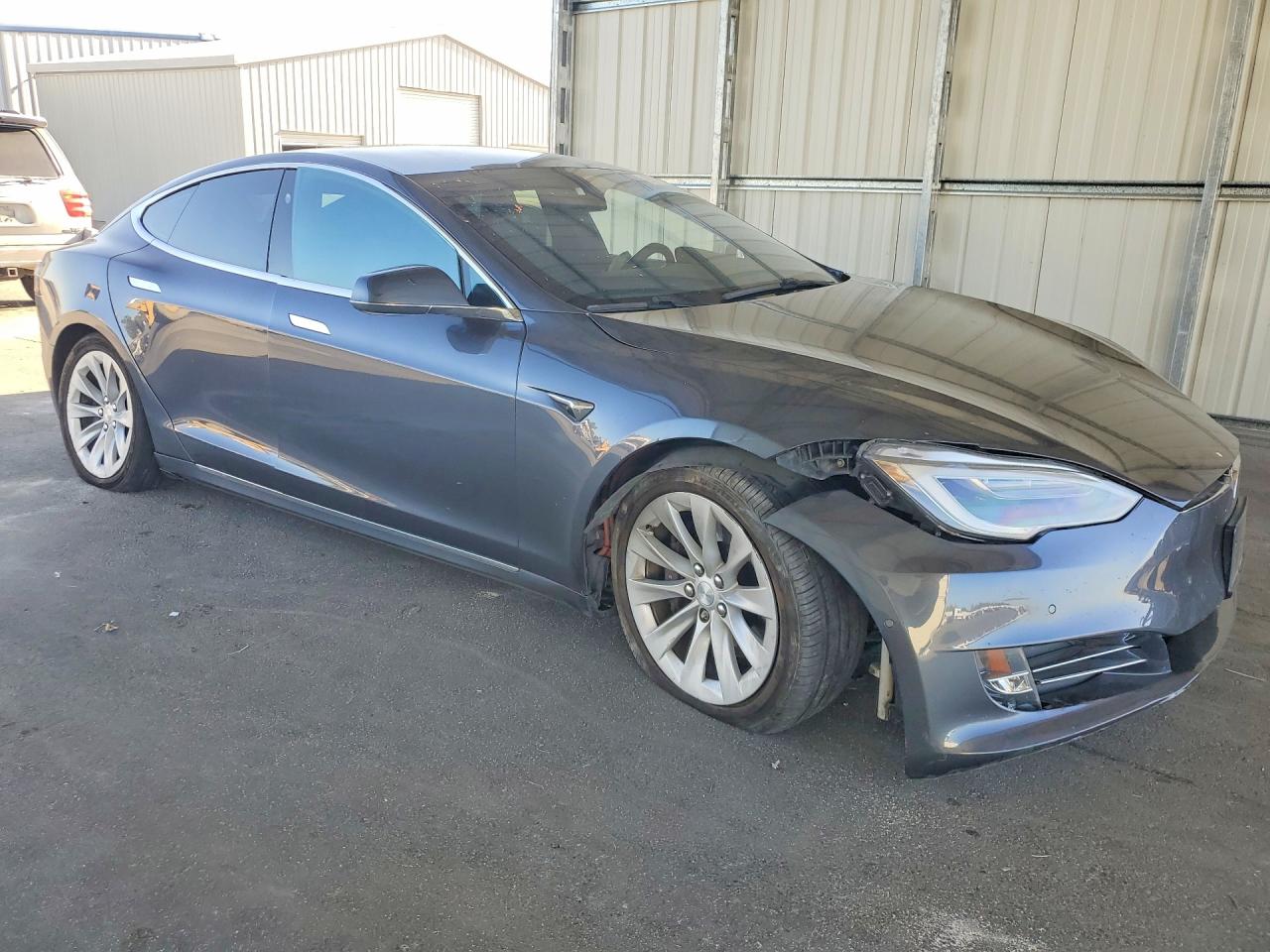 2017 Tesla Model S VIN 5YJSA1E17HF228118 COPART salvage auction — Front End, Dv - Clean Title, sold $3,300 on 2026-09-21 (photo 4)