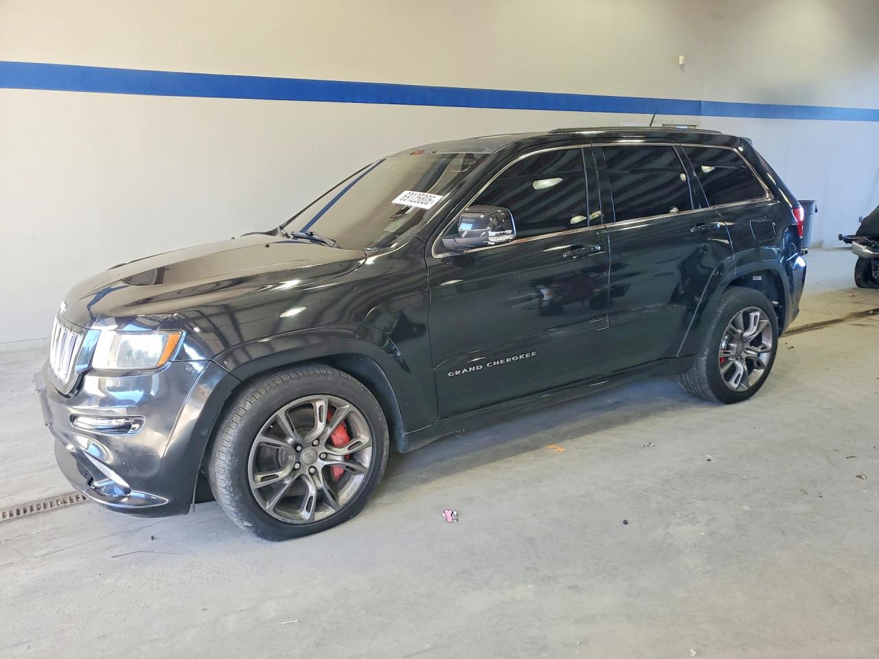 2012 Jeep Cherokee VIN 1C4RJFDJ9CC311973 — COPART salvage auction photo