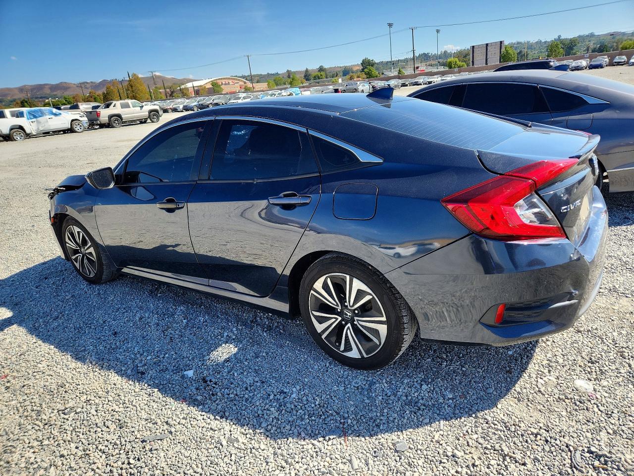 2016 Honda Civic VIN 19XFC1F38GE218875 COPART salvage auction — Front End, CA - DIS/DLR/EXP ONLY CLEAN TITLE, sold $2,550 on 2026-10-03 (photo 2)