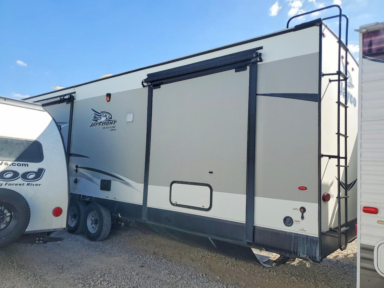 2017 VIN 1UJBJ0BV2H11K0077 COPART salvage auction — Hail, St - Salvage Title, sold $9,500 on 2026-09-24 (photo 3)