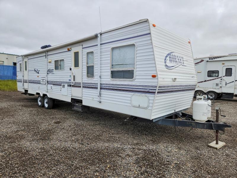 2002 Keystone Hornet VIN 4YDT37D2027306194 COPART salvage auction — HAIL, AB - OOP - ACTIVE, sold $100 on 2026-10-06 (photo 1)