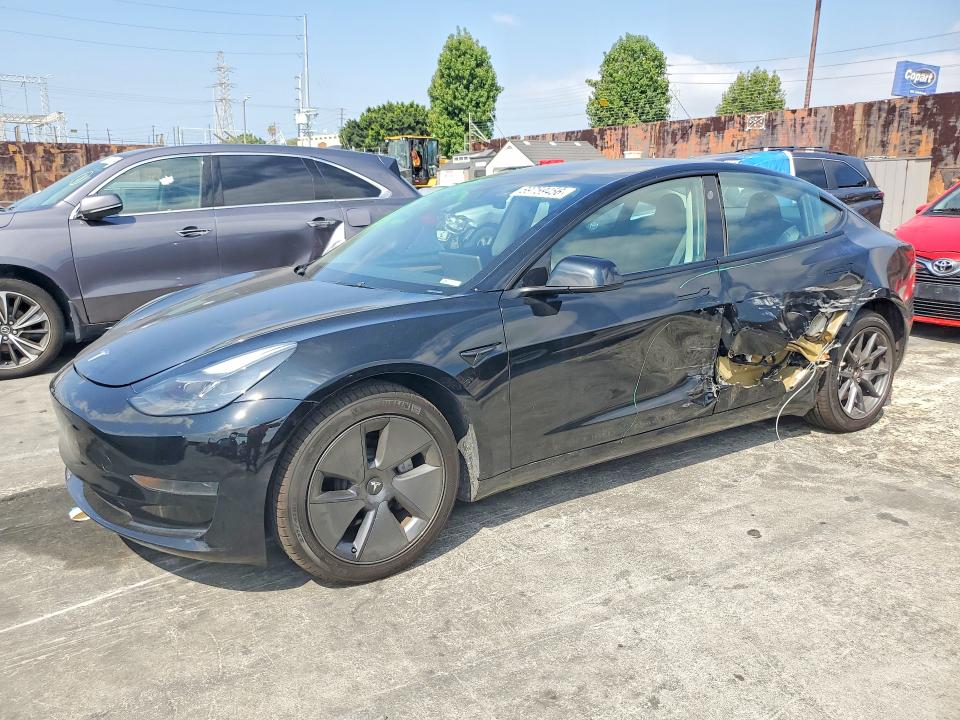 2023 Tesla Model 3 VIN 5YJ3E1EA2PF568977 — COPART salvage auction photo
