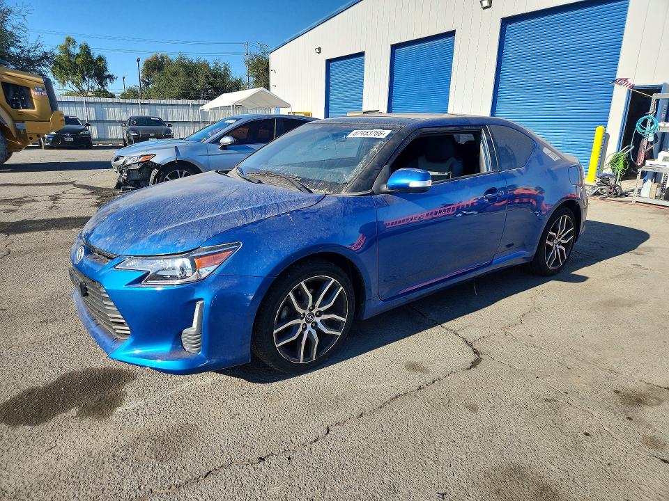 2014 Scion Tc VIN JTKJF5C72E3080649 COPART salvage auction — SIDE, Salvage Title, sold $1,550 on 2026-09-08 (photo 1)
