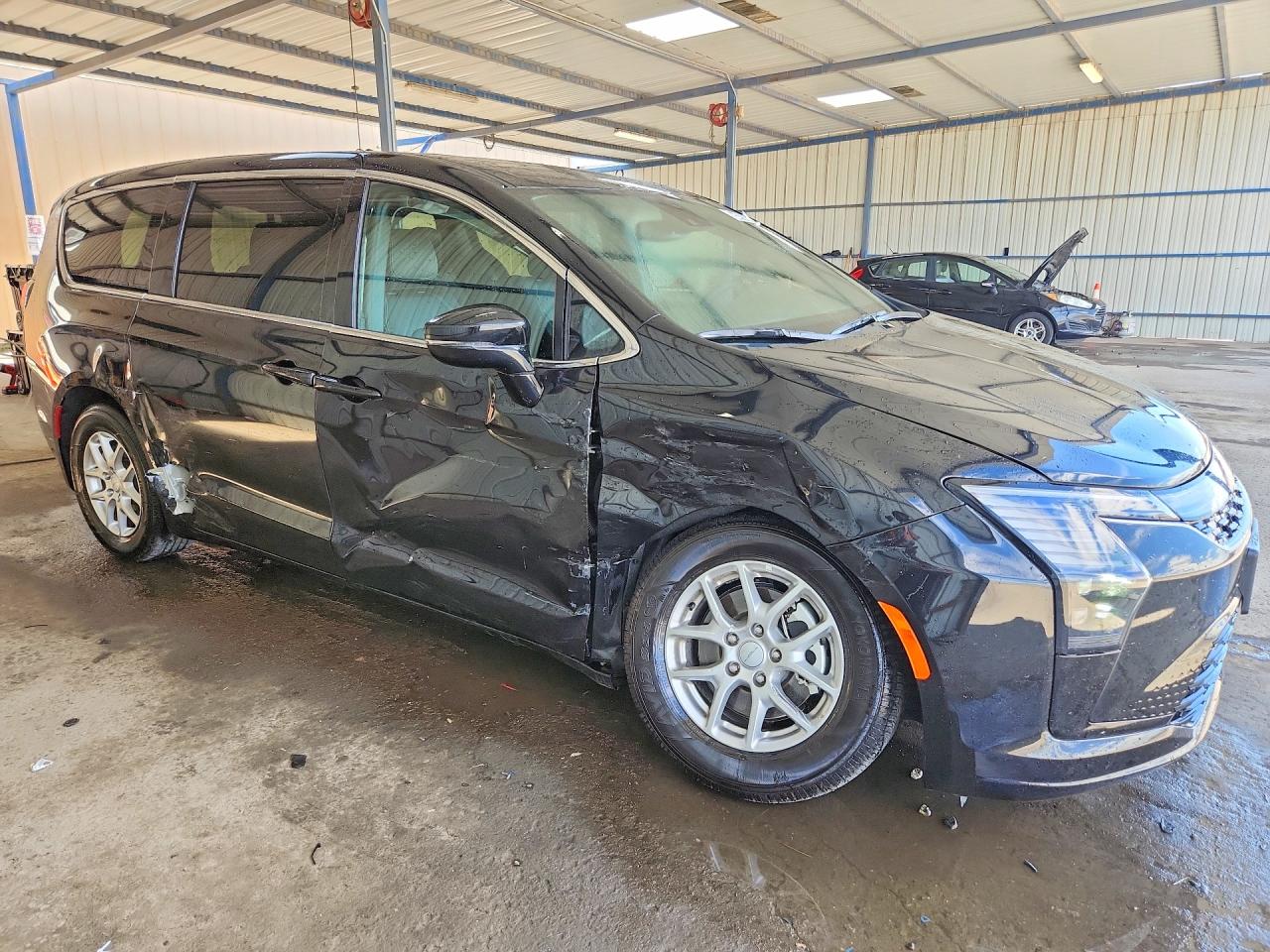 2027 Chrysler Pacifica VIN 2C4RC1BG4VR571857 COPART salvage auction — Side, CO - CERTIFICATE OF TITLE (P), sold $18,000 on 2026-09-23 (photo 4)