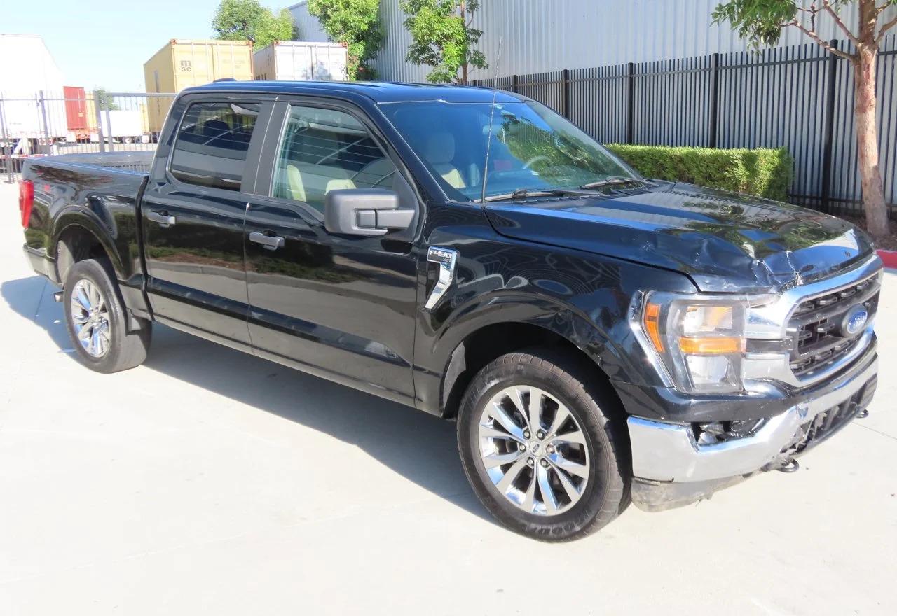 2023 Ford F-150 Lightning VIN 1FTFW1E80PFC47510 — COPART salvage auction photo