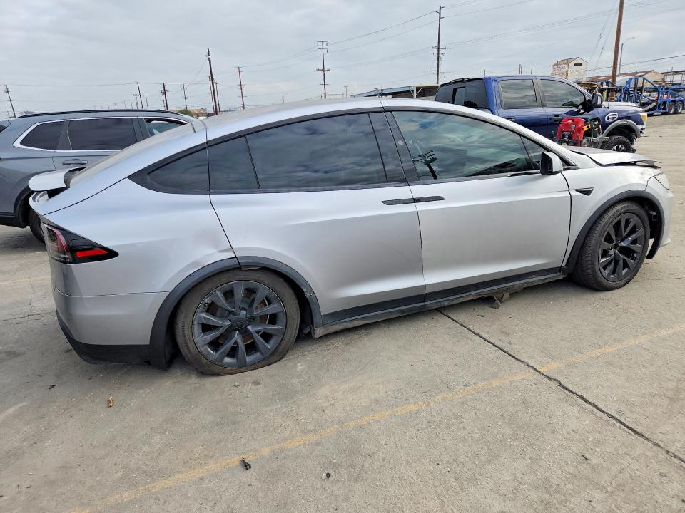 2025 Tesla Model X VIN 7SAXCDE56SF463608 COPART salvage auction — FRONT END, Or - Dis/Dlr/Exp Only Salvage Title, sold $30,500 on 2026-09-17 (photo 3)