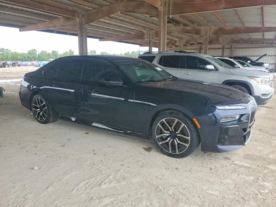 2023 BMW 7er VIN WBA33EJ0XPCM28471 COPART salvage auction — WATER/FLOOD, Tx - Salvage Title-Flood Damage, sold $36,500 on 2026-10-02 (photo 4)