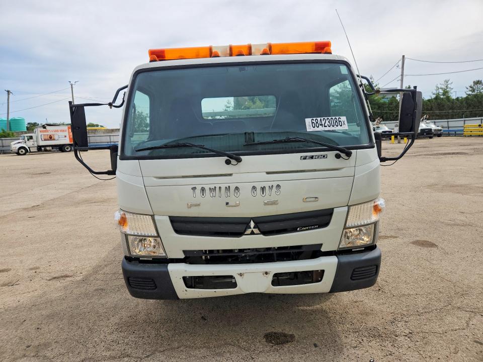 2017 Mitsubishi VIN JL6CRE1A1HK002371 COPART salvage auction — MINOR DENT/SCRATCHES, WI - CERTIFICATE OF TITLE, sold $7,400 on 2026-09-17 (photo 5)