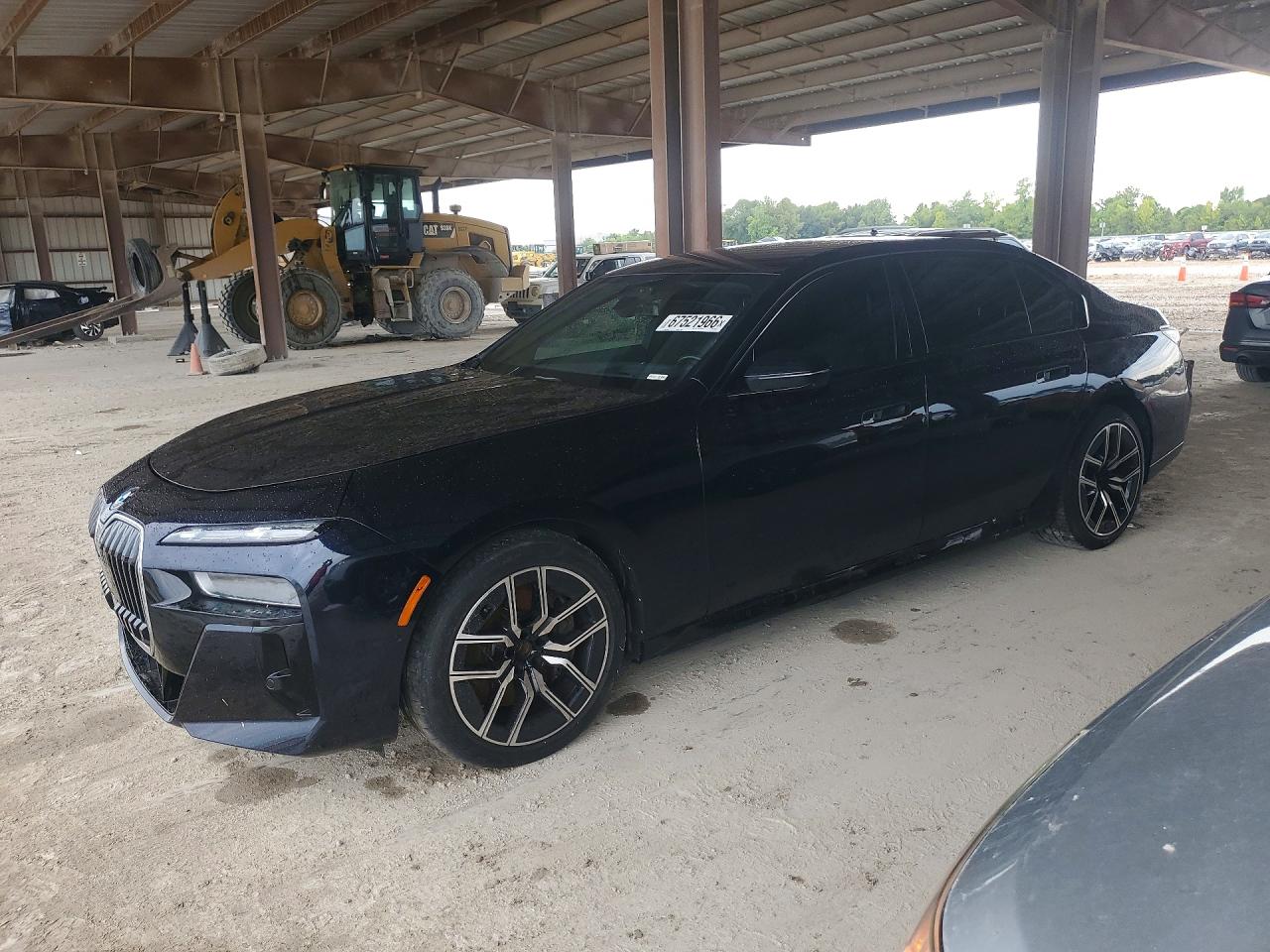 2023 BMW 7er VIN WBA33EJ0XPCM28471 COPART salvage auction — Water/Flood, TX - SALVAGE TITLE-FLOOD DAMAGE, sold $32,500 on 2026-09-18 (photo 1)