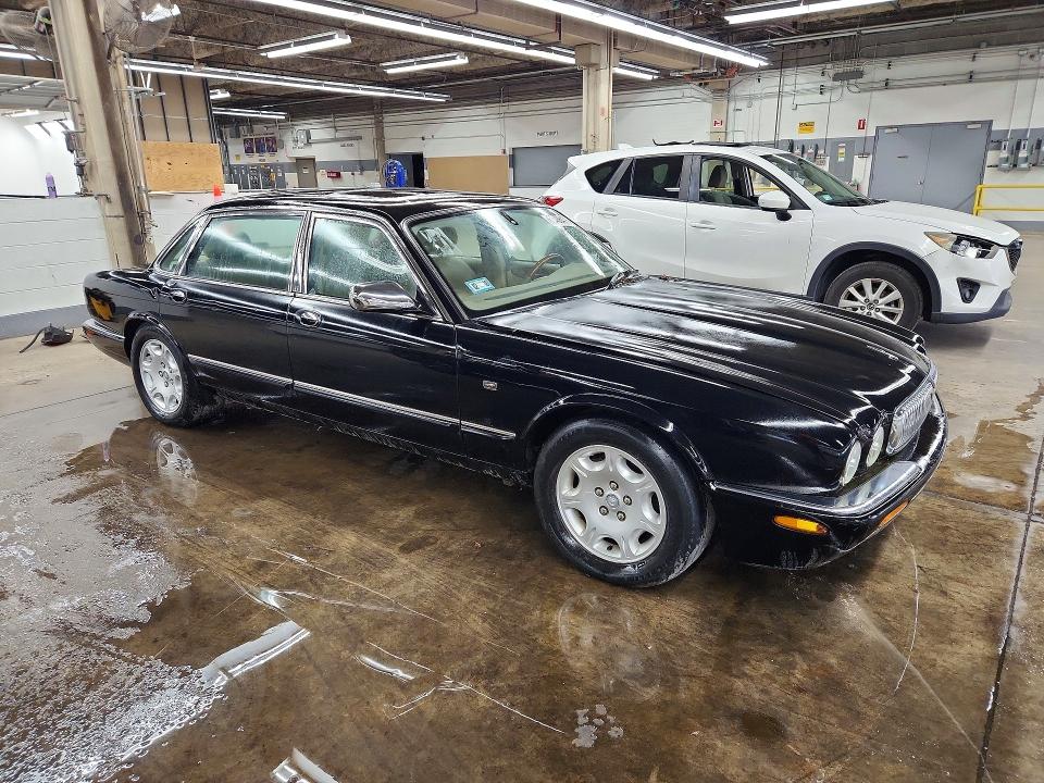 2003 Jaguar Xj VIN SAJDA24C23LF55943 COPART salvage auction — MECHANICAL, Il - Certificate Of Title, sold $975 on 2026-10-01 (photo 4)