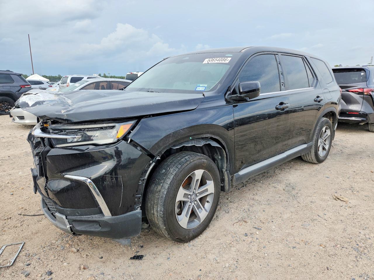 2023 Honda Pilot VIN 5FNYG2H56PB000588 — COPART salvage auction photo