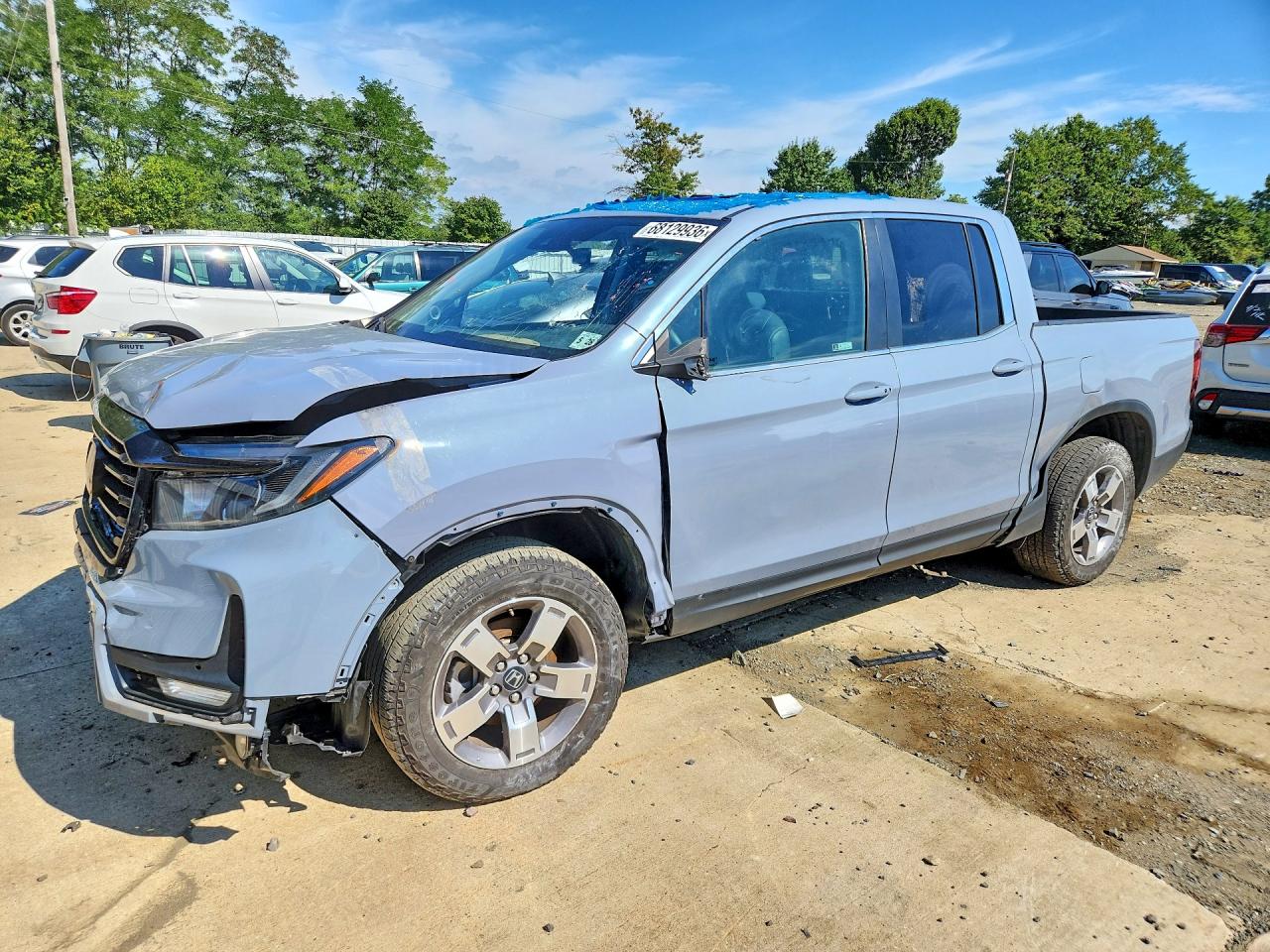 2024 Honda Ridgeline VIN 5FPYK3F52RB013338 — COPART salvage auction photo
