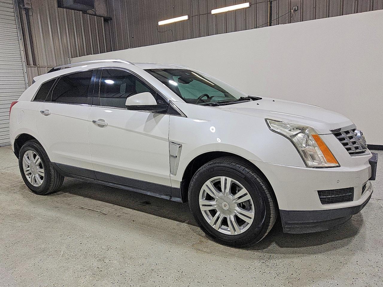 2015 Cadillac Srx VIN 3GYFNBE32FS620208 COPART salvage auction — Minor Dent/Scratches, FL - CERTIFICATE OF TITLE, sold $4,600 on 2026-10-01 (photo 4)