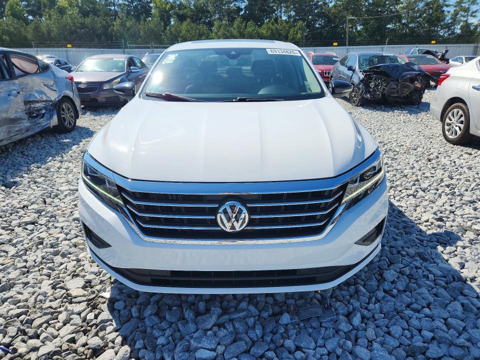 2022 Volkswagen Passat VIN 1VWBA7A3XNC006771 COPART salvage auction — MINOR DENT/SCRATCHES, Tx - Certificate Of Title (P), sold $7,400 on 2026-10-08 (photo 5)