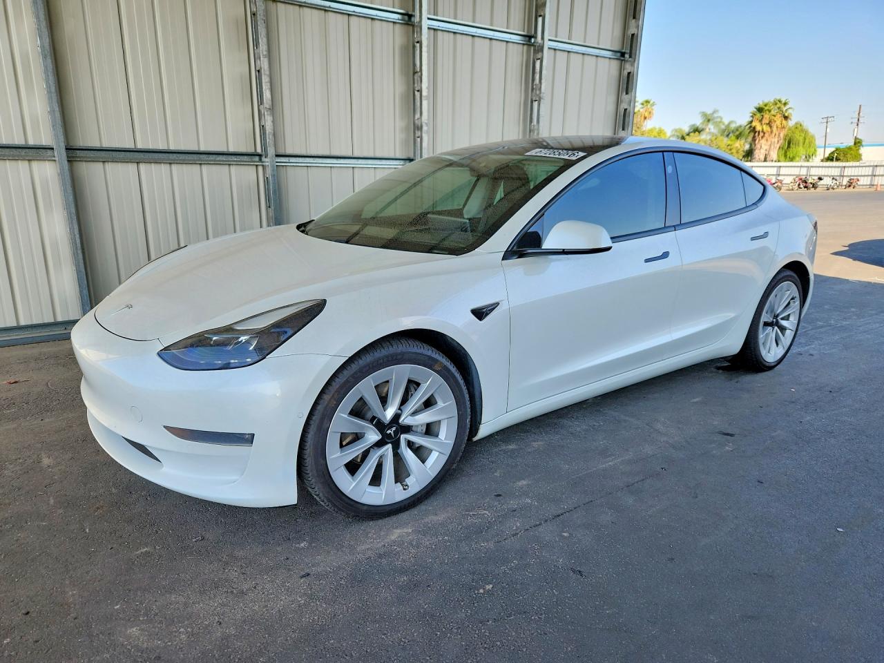 2021 Tesla Model 3 VIN 5YJ3E1EB7MF001295 — COPART salvage auction photo
