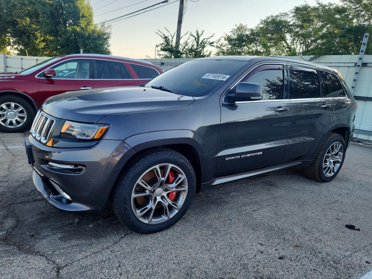 2015 Jeep Grand Cherokee VIN 1C4RJFDJ7FC778507 — COPART salvage auction photo