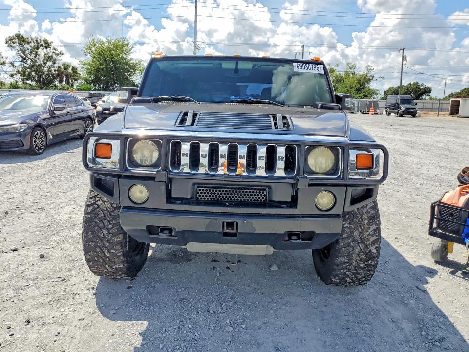 2005 Hummer H2 VIN 5GRGN22UX5H101324 COPART salvage auction — MINOR DENT/SCRATCHES, FL - CERTIFICATE OF TITLE, sold $8,800 on 2026-10-23 (photo 5)