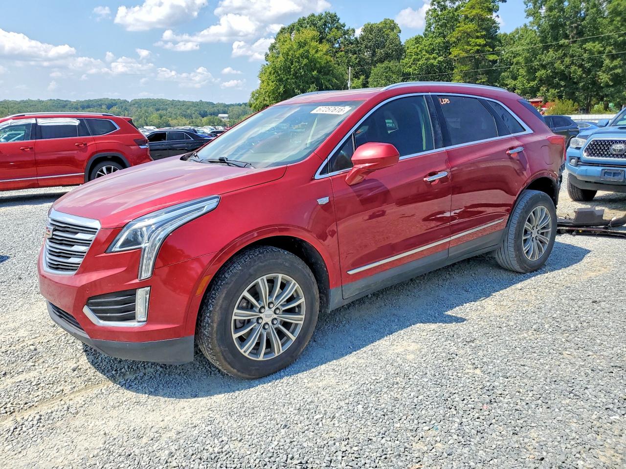 2019 Cadillac XT5 VIN 1GYKNCRS0KZ141529 — COPART salvage auction photo