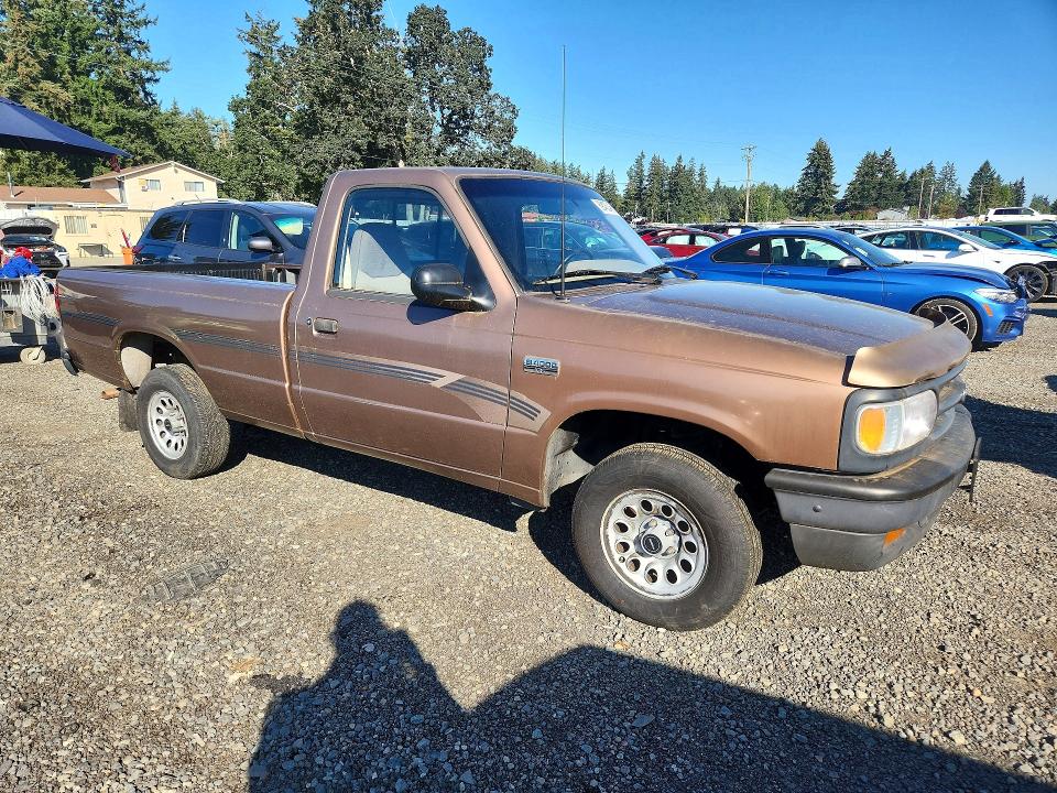 1994 Mazda B4000 VIN 4F4CR12X4RTM16817 COPART salvage auction — MINOR DENT/SCRATCHES, WA - VEHICLE CERT OF OWNERSHIP-TITL, sold $2,850 on 2026-10-02 (photo 4)