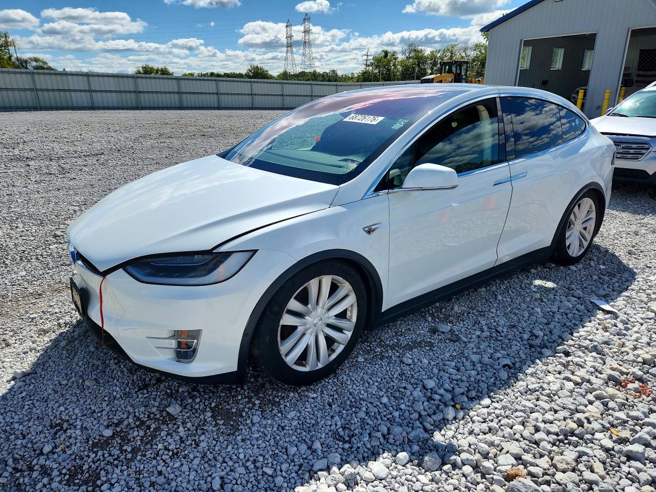 2016 Tesla Model X VIN 5YJXCBE22GF013193 — COPART salvage auction photo