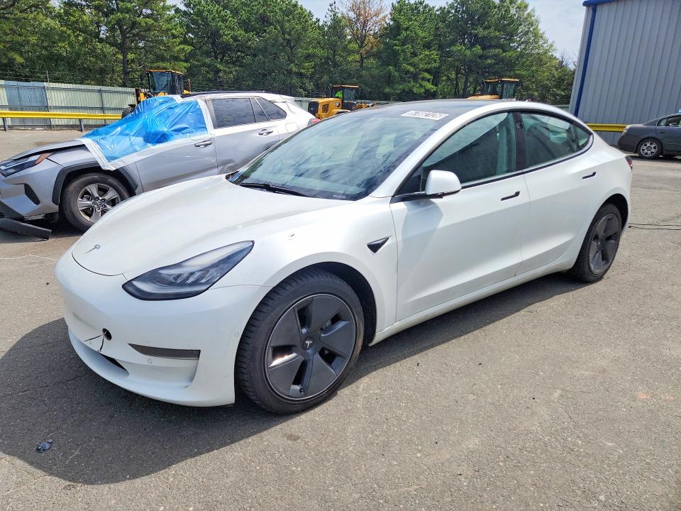 2021 Tesla Model 3 VIN 5YJ3E1EA0MF851972 — COPART salvage auction photo