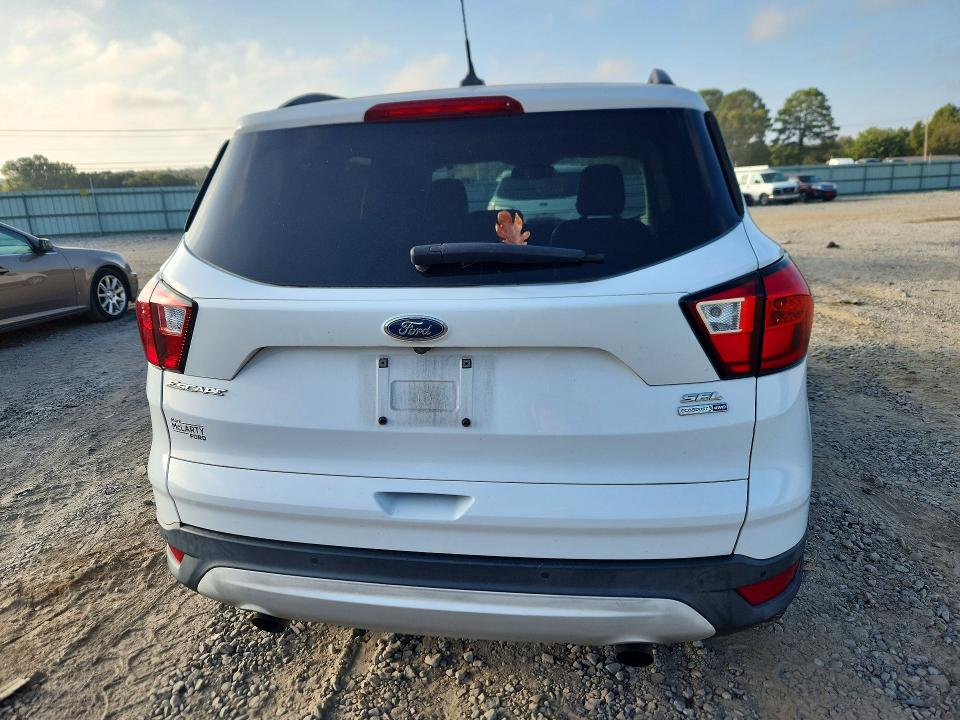 2019 Ford Escape VIN 1FMCU9HD2KUC45788 COPART salvage auction — MINOR DENT/SCRATCHES, Ar - Certificate Of Title, sold $90 on 2026-10-05 (photo 6)
