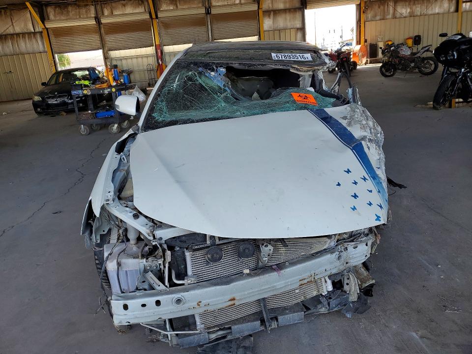 2015 Scion Tc VIN JTKJF5C72FJ004880 COPART salvage auction — ALL OVER, AZ - CERT OF TITLE - SALVAGE, sold $225 on 2026-09-23 (photo 5)