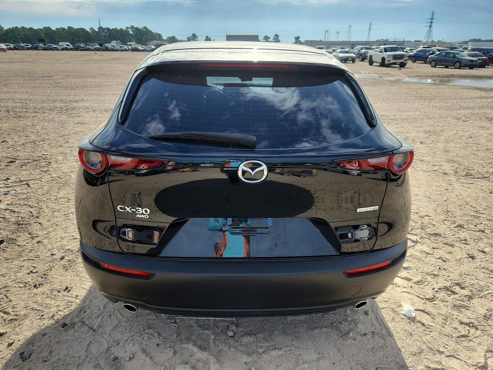 2025 Mazda Cx-30 VIN 3MVDMBAM7SM835336 COPART salvage auction — FRONT END, TX - SALVAGE VEHICLE TITLE (P), sold $4,300 on 2026-09-11 (photo 6)