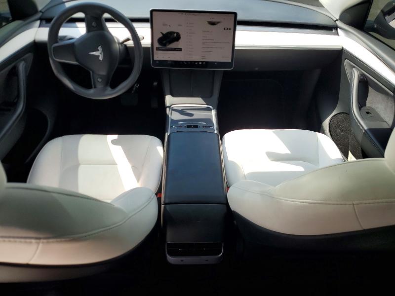2023 Tesla Model y VIN 7SAYGAEE8PF861529 COPART salvage auction — WATER/FLOOD, NY, sold $10,900 on 2026-10-03 (photo 8)