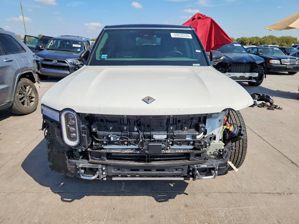 2023 Rivian R1s VIN 7PDSGBBA3PN024840 COPART salvage auction — FRONT END, Tx - Salvage Vehicle Title, sold $20,000 on 2026-10-01 (photo 5)