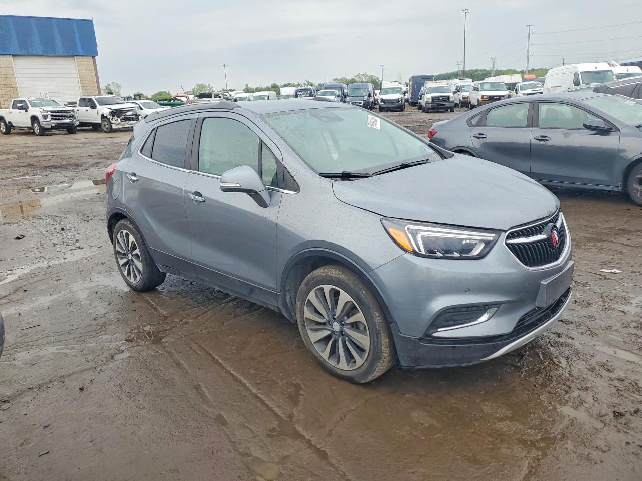 2019 Buick Encore VIN KL4CJCSMXKB940285 COPART salvage auction — Side, MT - CERT OF TITLE-REBUILT SALVAGE, sold $2,800 on 2026-10-02 (photo 4)