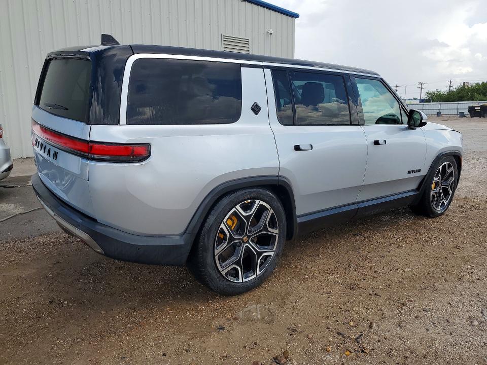 2023 Rivian R1s VIN 7PDSGABA0PN008136 COPART salvage auction — MINOR DENT/SCRATCHES, TX - CERT OF TITLE-REBUILT SALVAGE, sold $17,800 on 2026-09-18 (photo 3)