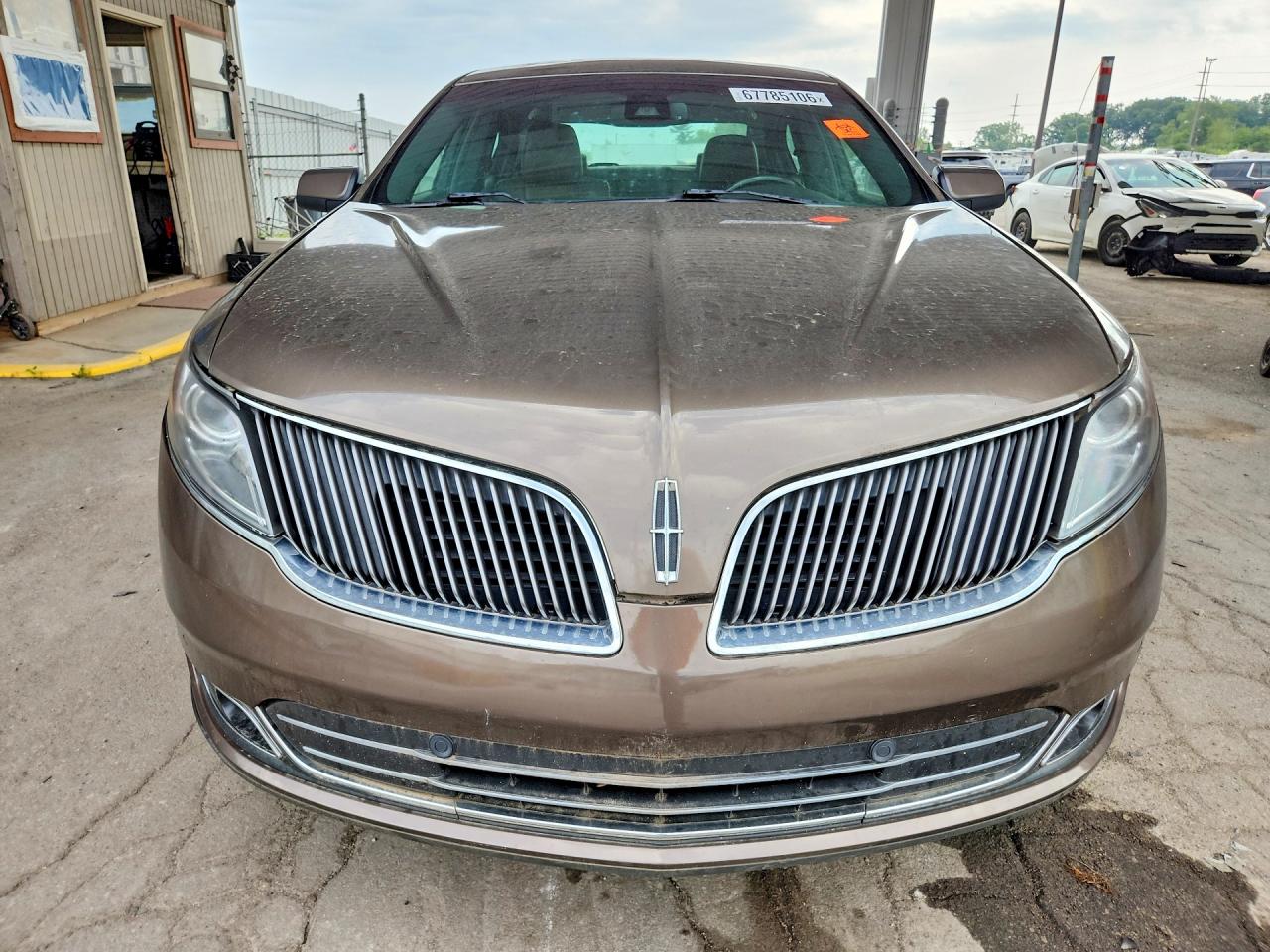 2015 Lincoln Mks VIN 1LNHL9EK5FG607497 COPART salvage auction — Mechanical, OH - CERTIFICATE OF TITLE, sold $1,700 on 2026-09-21 (photo 5)