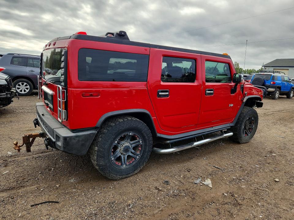 2004 Hummer H2 VIN 5GRGN23U04H115455 COPART salvage auction — SIDE, MI - DEALER ONLY-REBUILT SALVAGE, sold $2,150 on 2026-10-13 (photo 3)