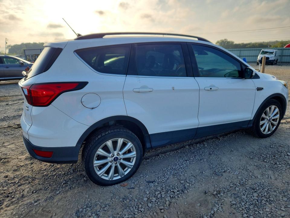 2019 Ford Escape VIN 1FMCU9HD2KUC45788 COPART salvage auction — MINOR DENT/SCRATCHES, Ar - Certificate Of Title, sold $90 on 2026-10-05 (photo 3)