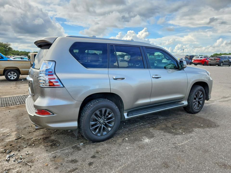 2023 Lexus Gx VIN JTJAM7BX7P5348285 COPART salvage auction — SIDE, Salvage Title, sold $34,250 on 2026-09-28 (photo 3)
