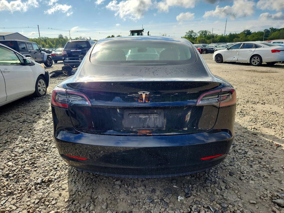 2021 Tesla Model 3 VIN 5YJ3E1EA0MF028426 COPART salvage auction — MINOR DENT/SCRATCHES, Ma - Certificate Of Title (P), sold $10,700 on 2026-10-07 (photo 6)